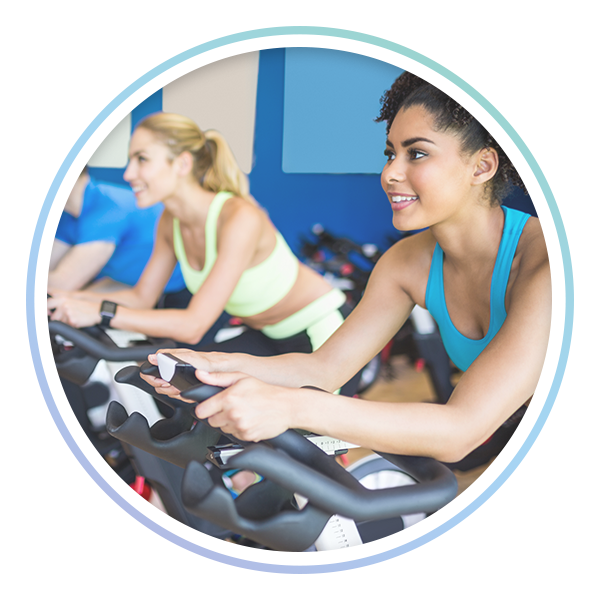 photo of women taking a spin class